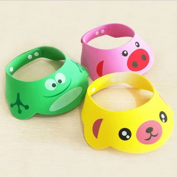 Дитячий регульований козирок для миття голови та стрижки Baby Shower Cap · Захисна шапочка для купання дитини